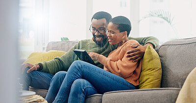 Buy stock photo Tablet, happy and black couple on sofa online for social media, internet and reading website. Love, home and man and woman on digital tech for bonding, relationship and relax together in living room