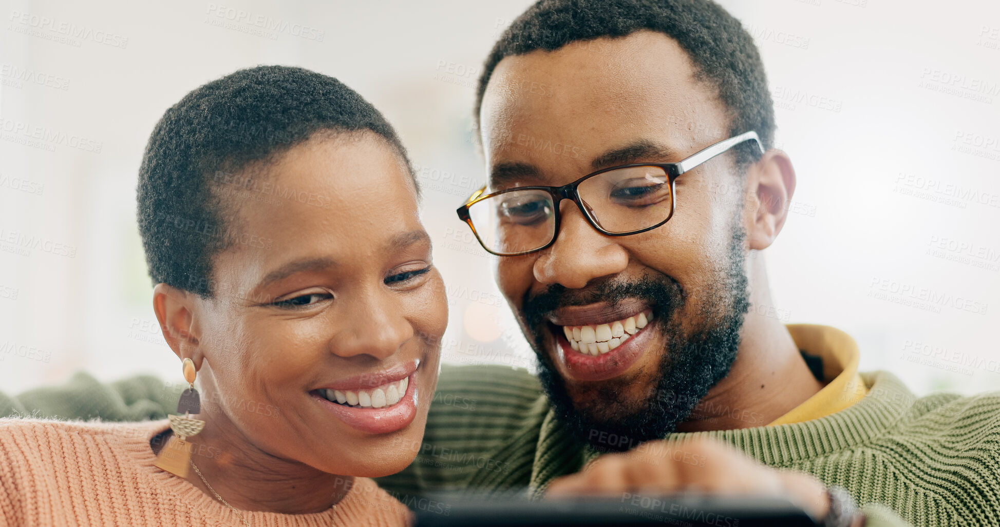 Buy stock photo Black couple, reading and home with love, support and care together on a living room sofa with smile. Date, romance and  happy people in the morning with communication and bonding in a house lounge