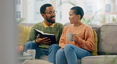 Buy stock photo Coffee, reading and happy couple at home on a living room sofa with a man and hot drink. Book, tea and smile with communication and relax conversation together with love and support on a couch