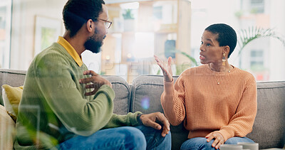 Buy stock photo Conflict, conversation and a black couple with a fight in marriage for relationship stress or problem. House, communication and an African man and woman speaking about a divorce, breakup or mistake