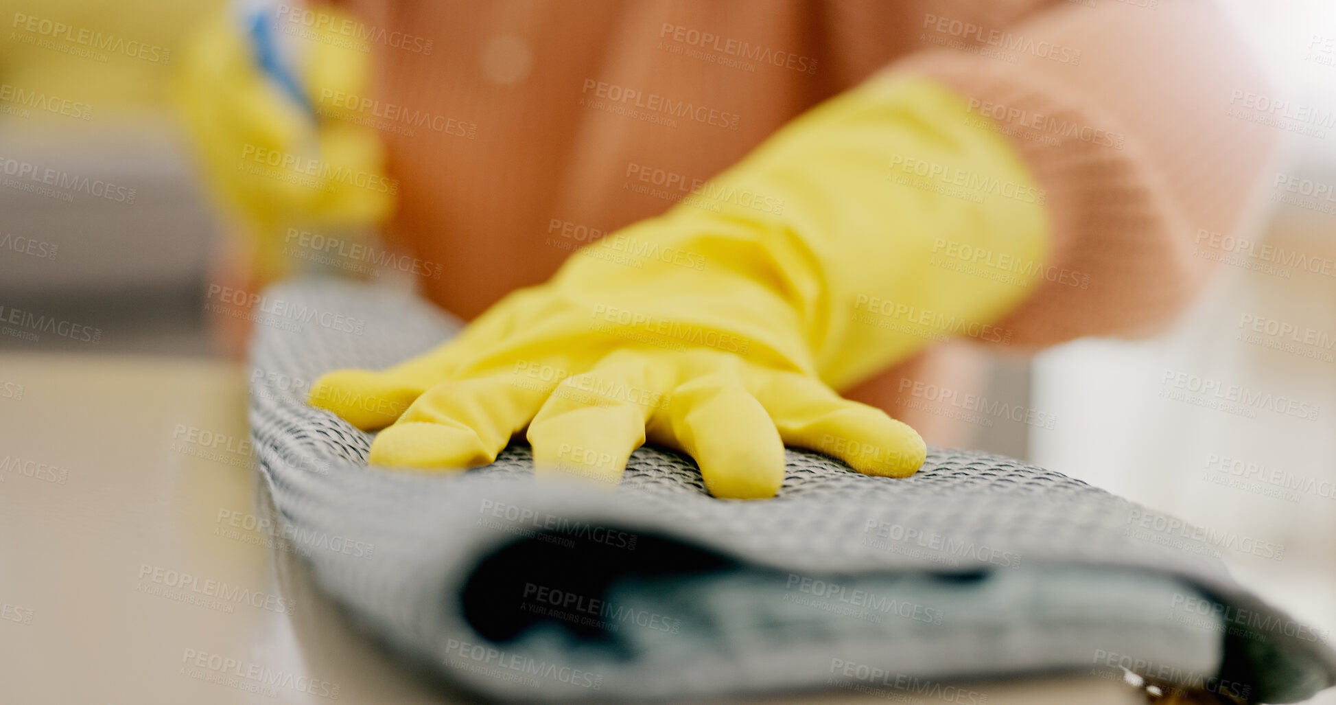 Buy stock photo Cleaning, cloth and hands with furniture in living room for hygiene, housework and maintenance in home. Housekeeping, closeup and person with gloves on table for bacteria, dirt and dust on surface
