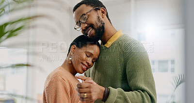 Buy stock photo Home, dancing and black couple with love, hug and romance with lens flare, smile and celebration. Romantic, man and woman with energy, relationship and embrace with support, anniversary and marriage