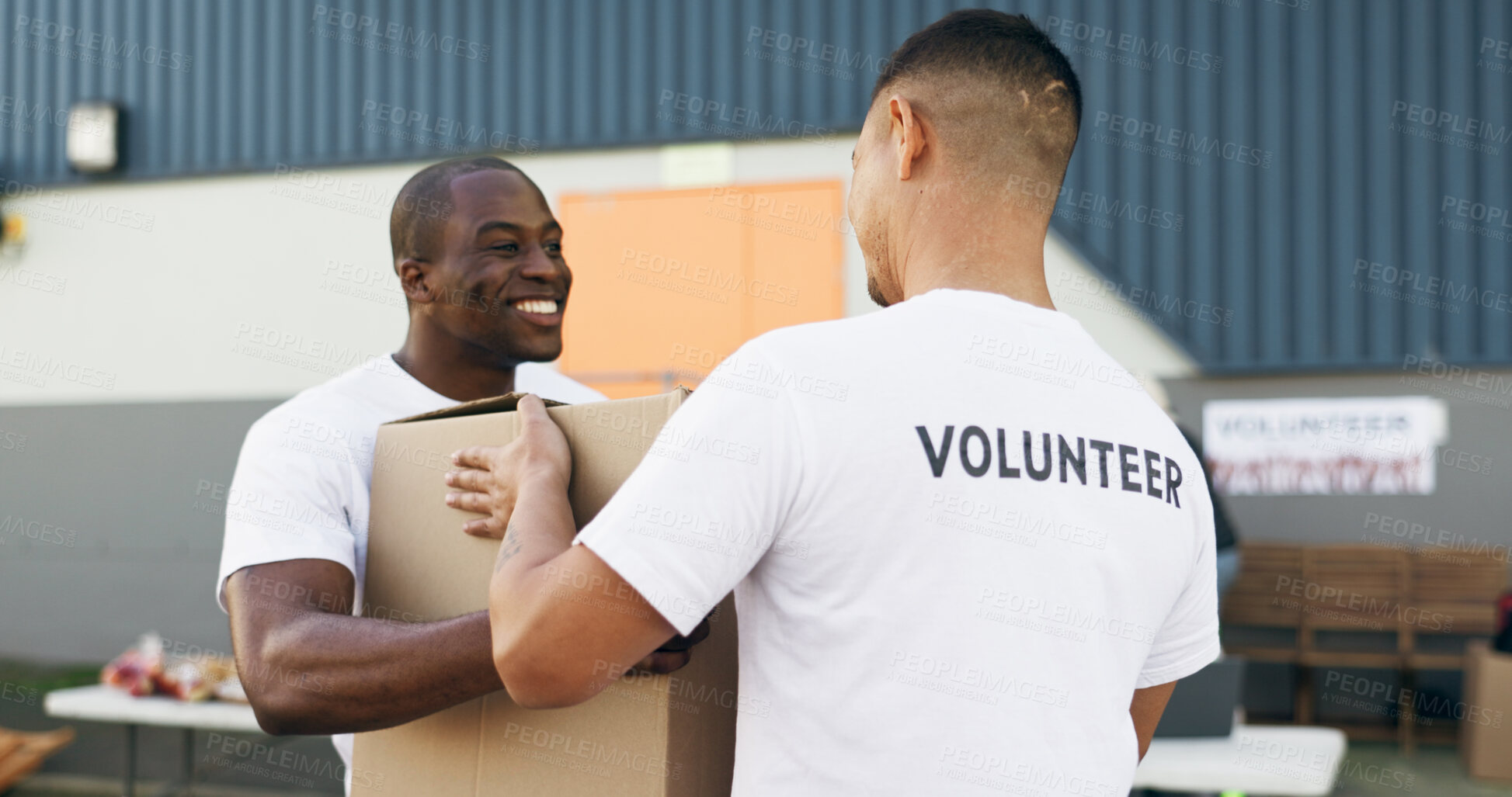 Buy stock photo Volunteer men, helping and boxes for charity, food and clothes drive with community service for kindness. Teamwork, support and social responsibility for donation package, smile and care in workshop