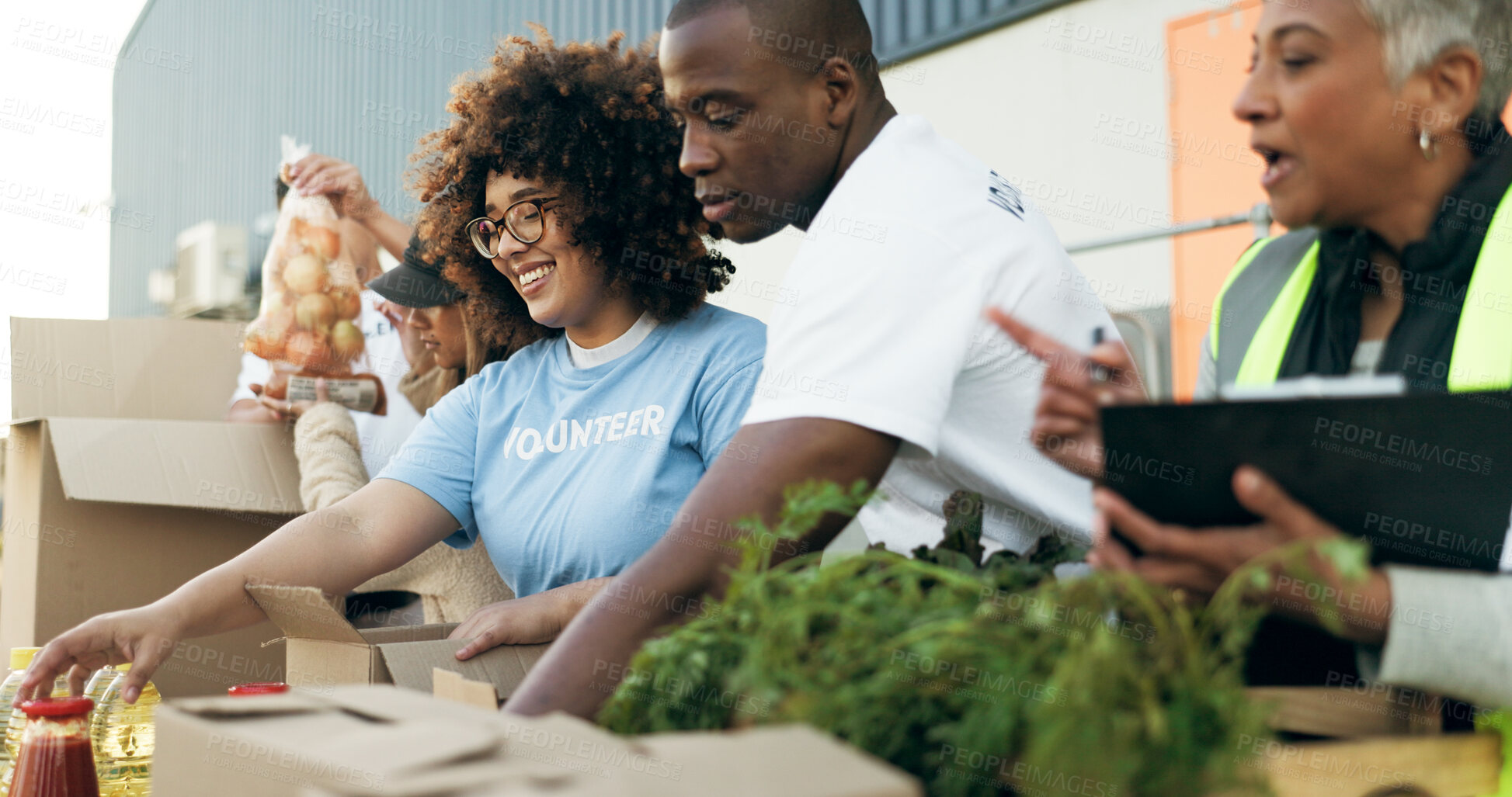 Buy stock photo Group of people, charity and food donation on table for community event with care, boxes and help. Volunteer team, men and women at ngo checking grocery package for distribution at non profit project