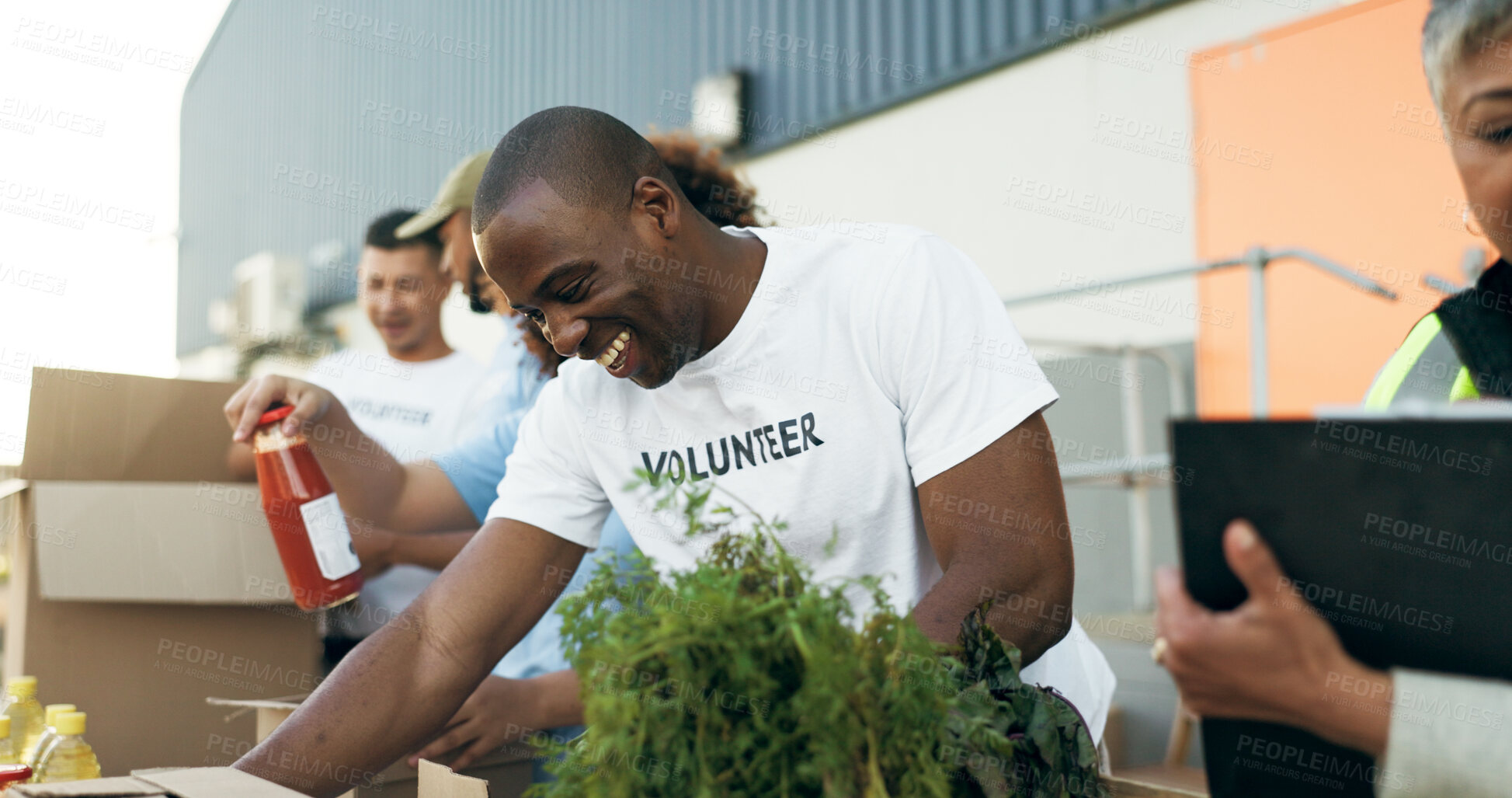 Buy stock photo Volunteer, men and women with food boxes on table for charity event with care, kindness and smile. Community donation, help and team at ngo with grocery package distribution at non profit project.