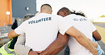 Recycle, charity and a volunteer group in a huddle together for teamwork, unity or solidarity. Community, team building and sustainability with ngo people hugging in support of an earth day project