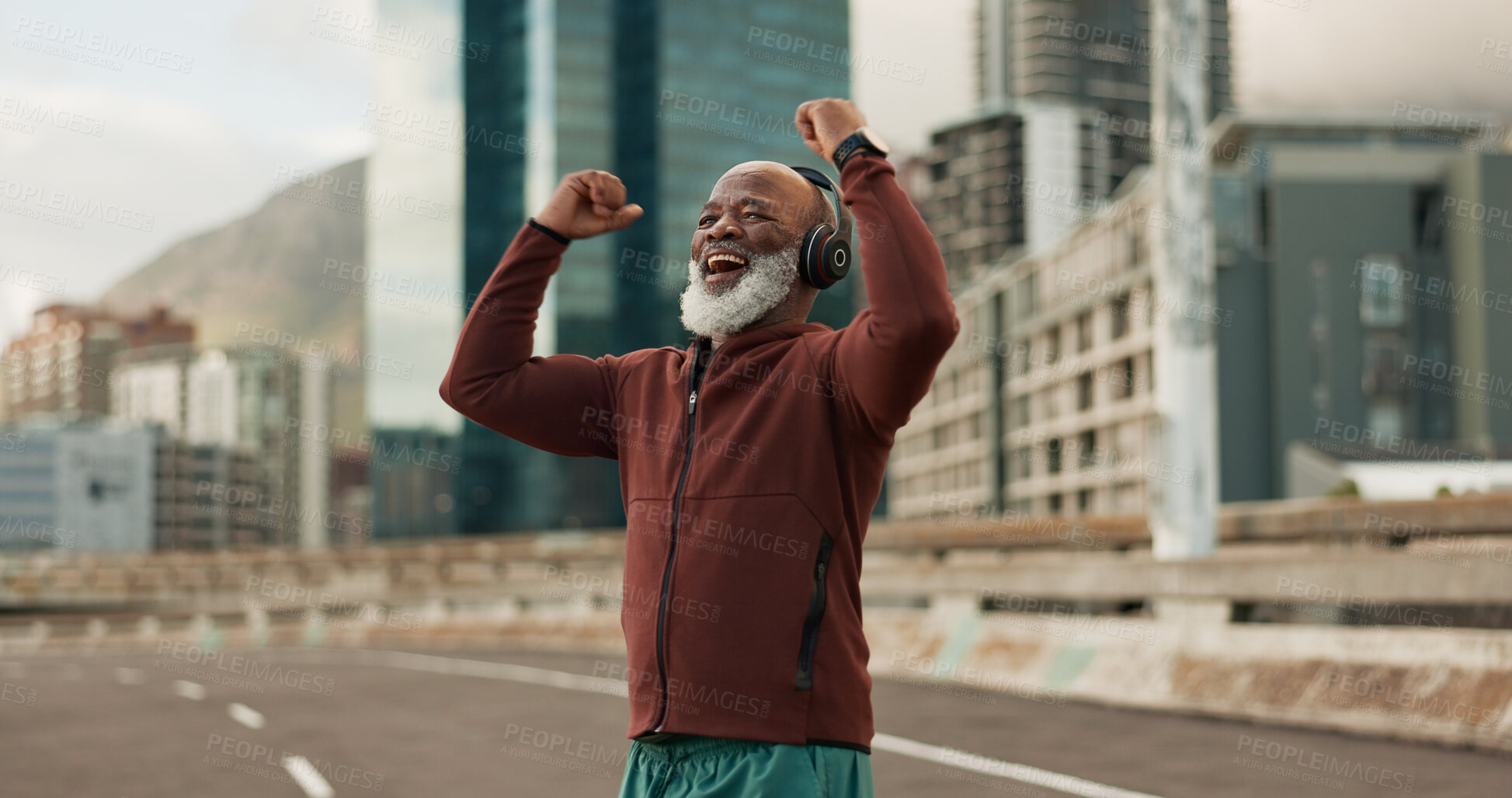 Buy stock photo Exercise, celebration and senior man, headphones, city and achievement with workout, streaming music and radio. African person, pensioner and runner with headset, progress and fitness wellness or joy