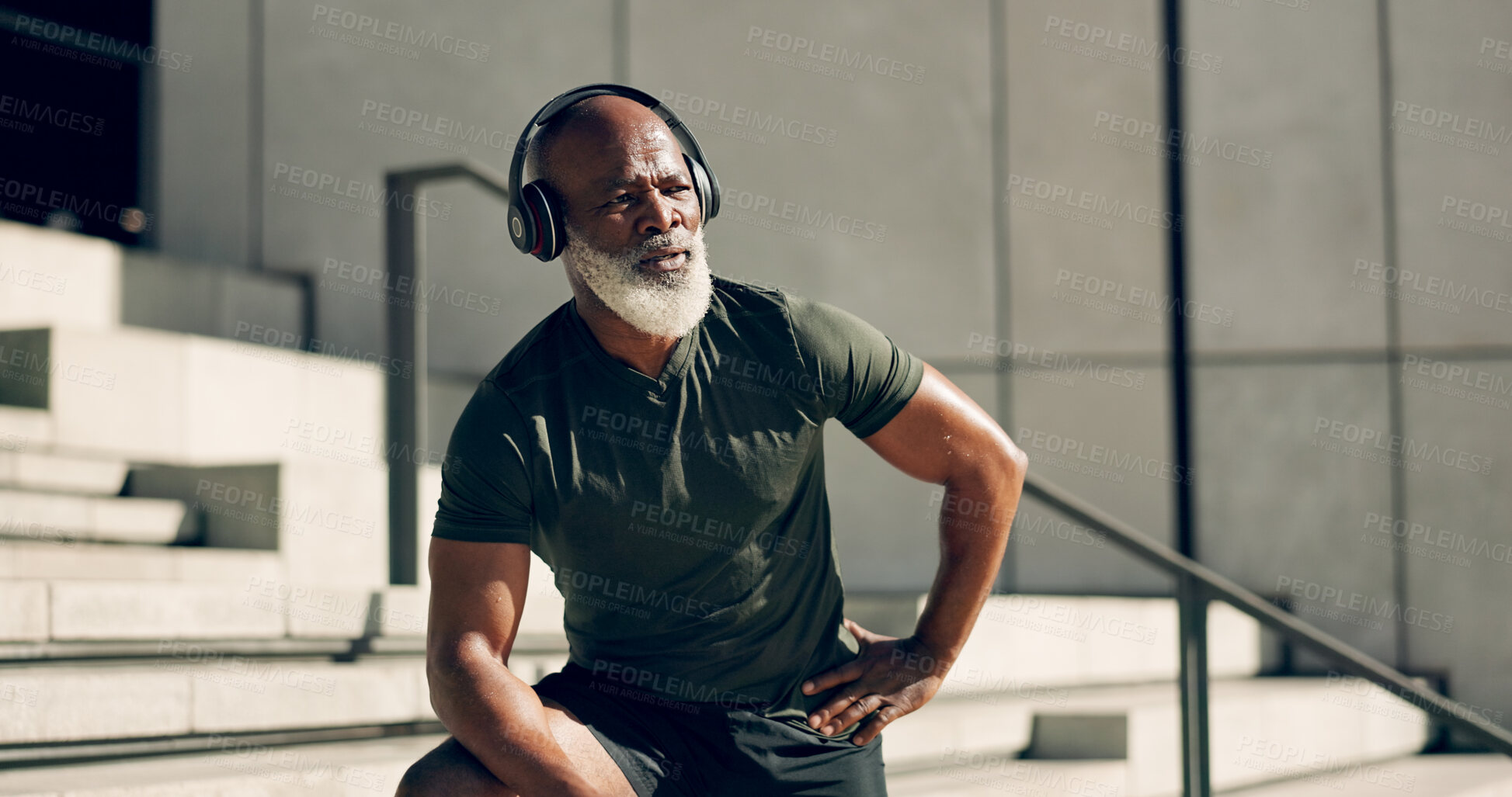 Buy stock photo Fitness, headphones and black man on steps in city, sweat after workout and exercise for body health. Music, senior athlete and stairs in urban town, listening to audio and serious, thinking or relax