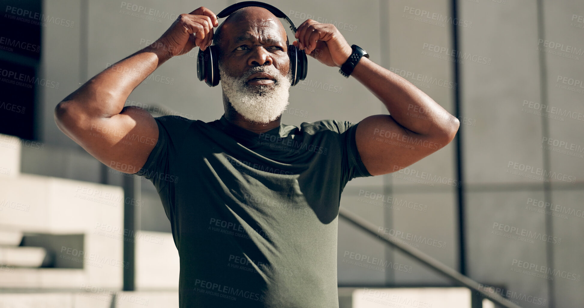 Buy stock photo Fitness, music headphones and black man on stairs in city, workout and exercise for body health. Radio, steps and senior athlete in urban town, listening to audio sound and serious, thinking or relax