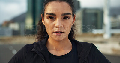 Fitness, city portrait and woman exercise, determined and ready for outdoor cardio, workout commitment or sports. Sweaty face, road and active athlete, runner or person for street training challenge