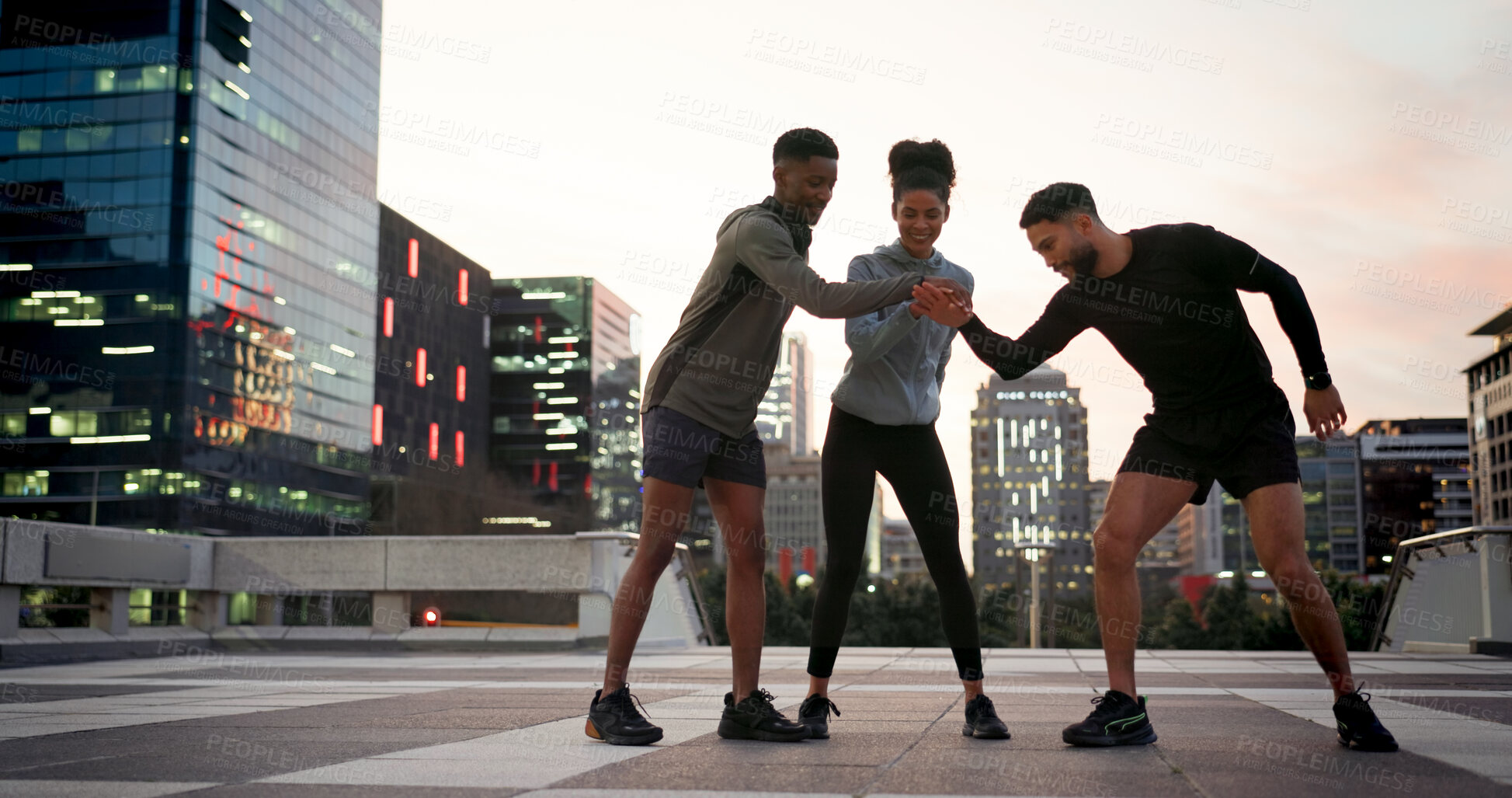 Buy stock photo Friends, group or runner with hands together outdoor for fitness, exercise or motivation during workout. Athlete, men and woman or high five for team building, happy and support for running challenge