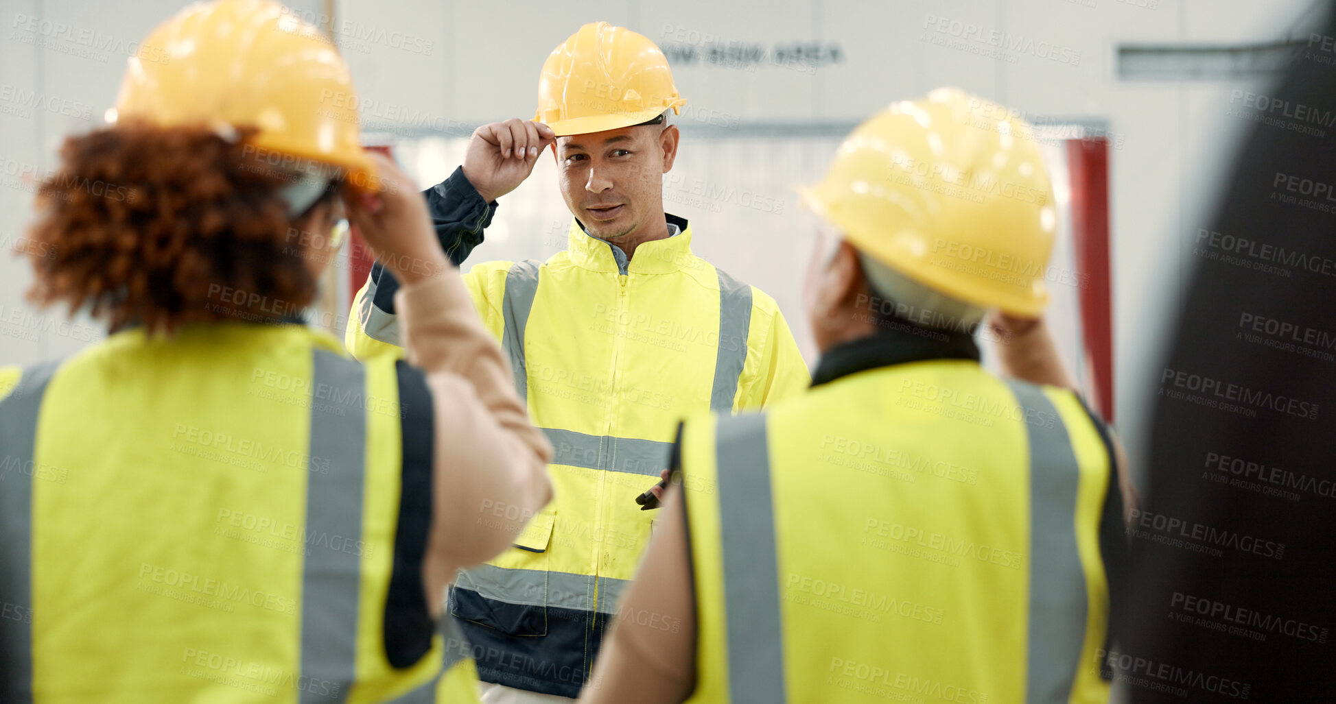 Buy stock photo Construction site, teamwork and people in meeting for planning, brainstorming and discussion in building. Architecture, engineering and men and women for inspection, property development and project