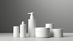 Various beauty product containers, for hygiene, health and skin care, grey background