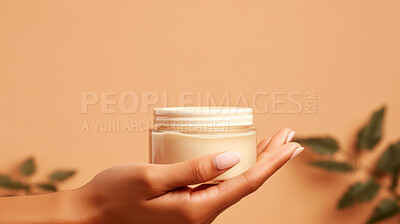 Close up of hand holding a jar of cosmetic product. Skincare hygiene moisturiser