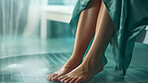 Close-up of manicured feet in foot spa. Beauty spa for treatment and relaxation