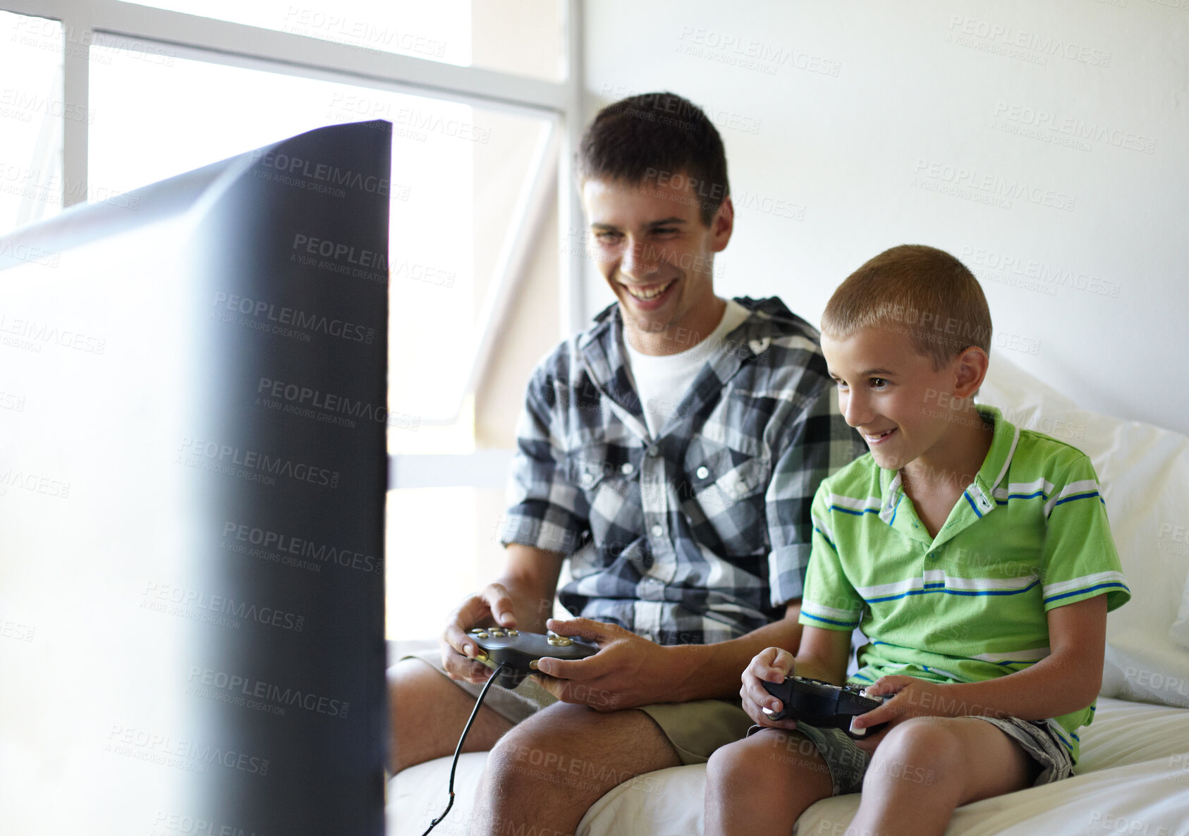 Buy stock photo Family, television and kids relax with video game, bond and having fun in their home. Happy, gaming and children in a bedroom playing tv, esports or enjoying weekend gamer with entertainment