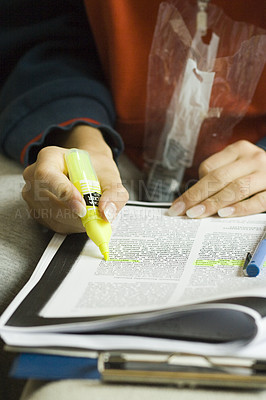 Buy stock photo Hand, study highlight and student with a textbook closeup in a home for education, learning or growth. Paper, writing and school with a person reading information at a desk for university scholarship