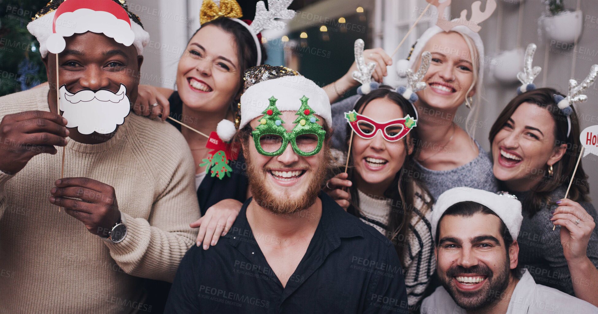 Buy stock photo Portrait, Christmas and friends with a man and woman group in a home for a party or celebration together. Diversity, happy and mask with a male and woman friend crown in house for the festive season