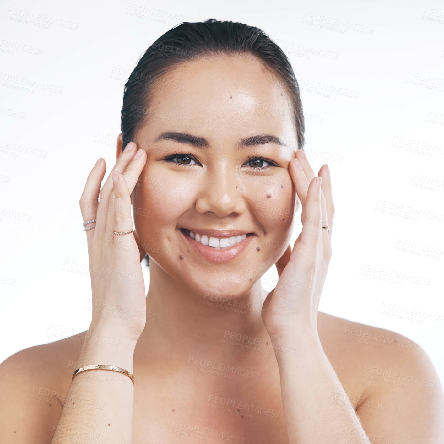 Buy stock photo Cropped shot of a beautiful young woman posing against a white background