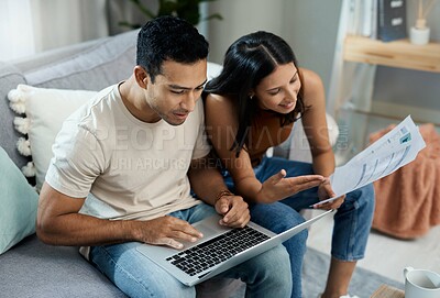 Buy stock photo Happy couple, laptop and documents on sofa in budget planning, finance or expenses and bills at home. Man and woman with paperwork on computer in living room for financial plan or insurance at house