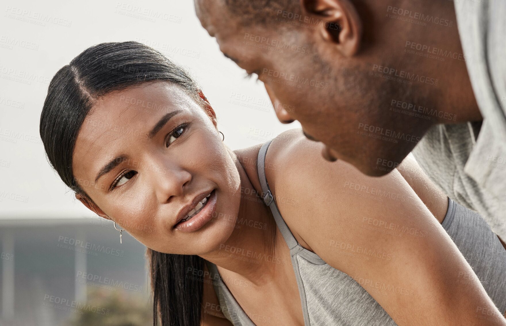 Buy stock photo Closeup shot of an athletic couple looking at each other