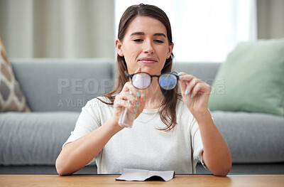 Buy stock photo Home, cleaning and glasses with woman, lens and eye care protection with liquid, bottle and optic maintenance. Person, house or woman with eyewear, frames or cloth to wipe spectacle for clear vision