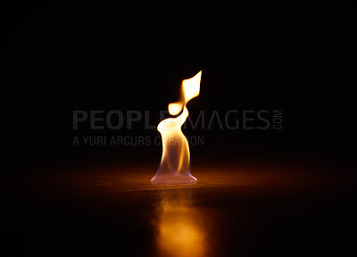 Buy stock photo Flame, heat and fire with black background with start, gas and light from burning in studio. Fuel, flare and glow from thermal power and art in the dark with creativity and inferno with burn