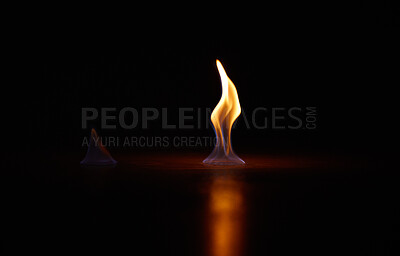 Buy stock photo Flame, heat and fire start with black background with sparks, smoke and light from burning in studio. Fuel, flare and glow from thermal power and art in the dark with creativity and inferno with burn