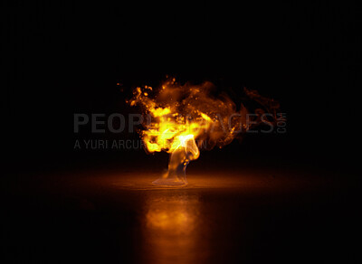 Buy stock photo Flame, heat and fire explosion with black background with sparks, gas and light from burning in studio. Fuel, flare and glow from thermal power n dark with creativity and inferno with danger