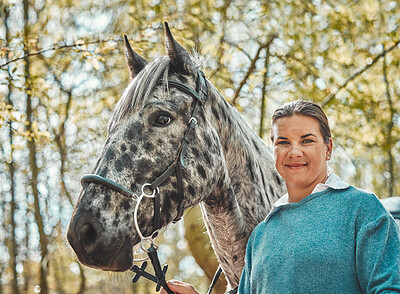Portrait of horse with happy woman in woods, nature and love for animals, pets or dressage with trees. Equestrian sport, jockey or rider in forest for outdoor adventure, training and smile on face.
