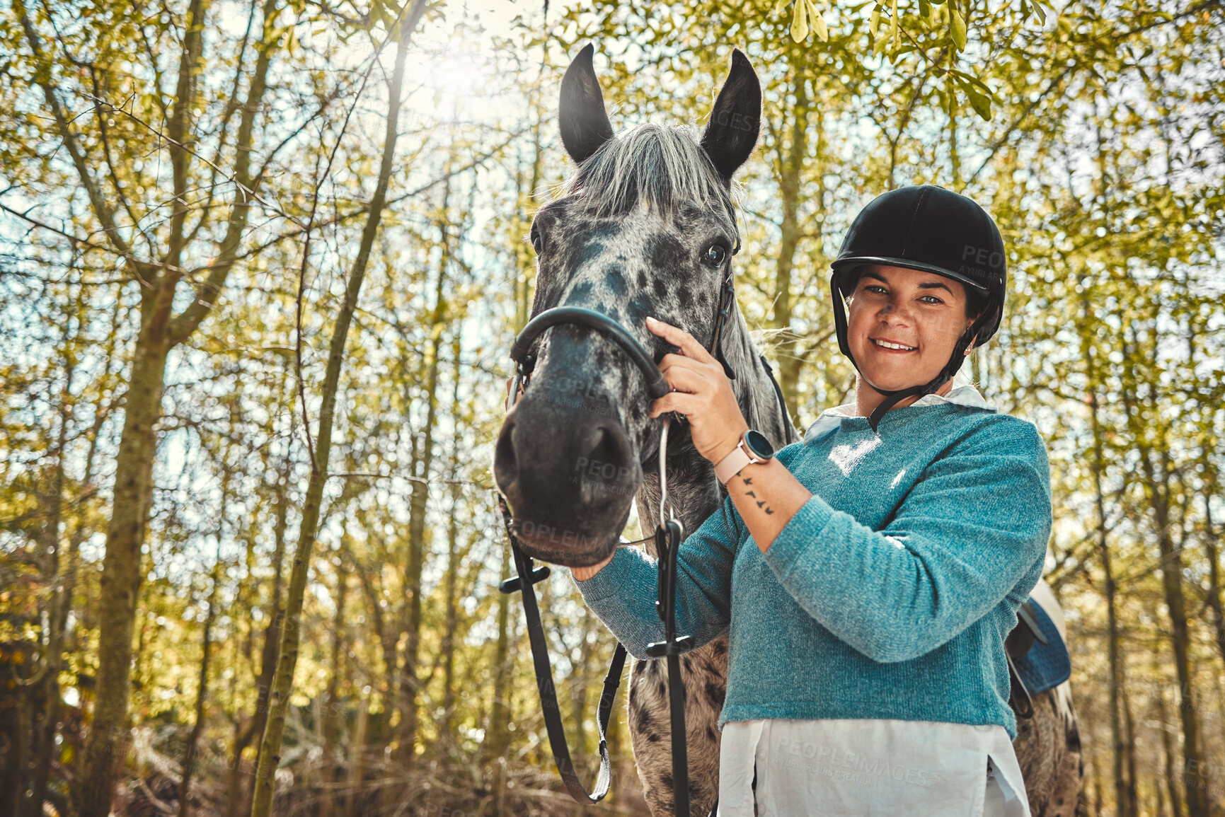 Buy stock photo Portrait of woman with horse in woods, smile and pride for competition, race or dressage with trees. Equestrian sport, face of jockey or rider with animal in forest for adventure, training and care.