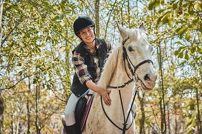 Portrait of happy woman on horse, riding in forest and practice for competition, race or dressage with trees. Equestrian sport, jockey or rider on animal in woods for adventure, training and care.
