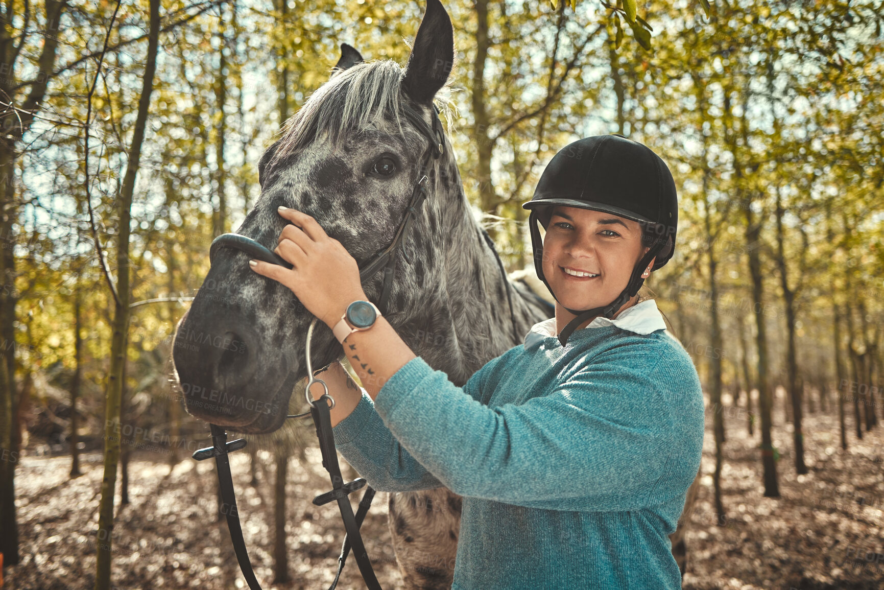 Buy stock photo Portrait of woman with horse in forest, smile and pride for competition, race or dressage with trees. Equestrian sport, face of jockey or rider with animal in woods for adventure, training and care.