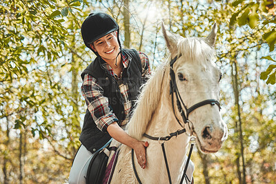 Portrait of happy woman on horse, riding in woods and practice for competition, race or dressage with trees. Equestrian sport, jockey or rider on animal in forest for adventure, training and smile.