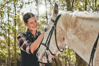 Happy woman with horse in forest, grooming in nature and love for animals, pets or dressage with trees. Equestrian sport, girl jockey or rider standing in woods for adventure, rub and smile on face.