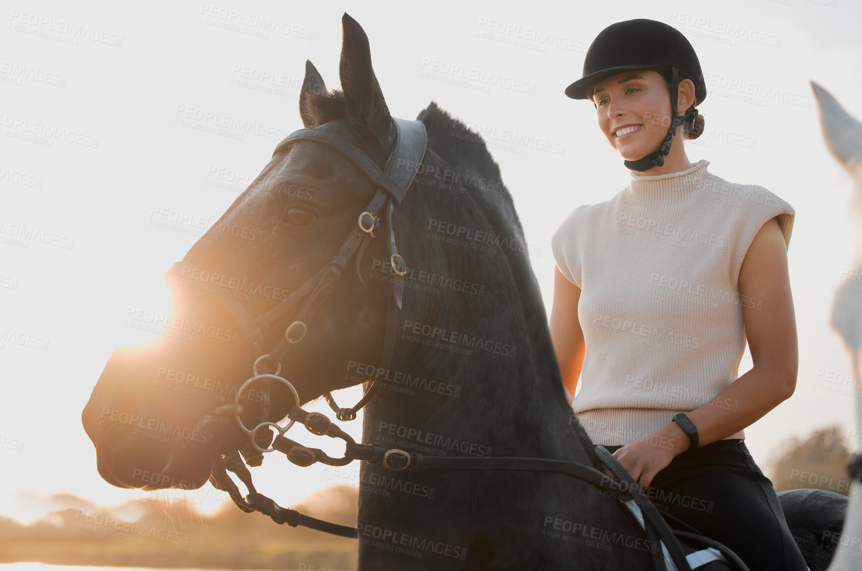 Buy stock photo Horse riding, smile and woman in countryside at sunset outdoor for freedom. Equestrian, girl and happy person with animal in field, nature and adventure to travel, journey and vacation in summer.