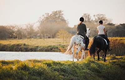 Buy stock photo Horseback riding, freedom and friends in nature by the lake during a summer morning with a view. Countryside, equestrian and female riders bonding outdoor together for wilderness travel or adventure