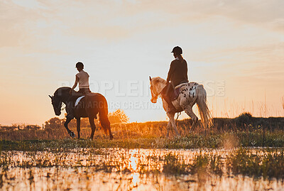 Buy stock photo Horseback, women and friends by lake in countryside at sunset with outdoor mockup space. Equestrian, girls and animals in water, nature and adventure to travel, journey or summer vacation together