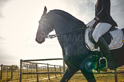 Buy stock photo Equestrian, person on horse in countryside, riding and sport with healthy active lifestyle, nature and jockey on farm or ranch. Rider outdoor with animal, sports and fitness with competition