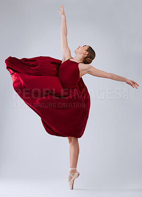 Buy stock photo Ballet, dance and woman training for performance, wellness and hobby on grey studio background. Ballerina, creative dancer and female young person practice, routine and artist dancing, talent or free