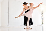 Ballet class, child learning dance and teacher with student in studio for dancing, art and coaching. Girl with woman ballerina coach or dancer to learn feet balance for academy performance and mockup