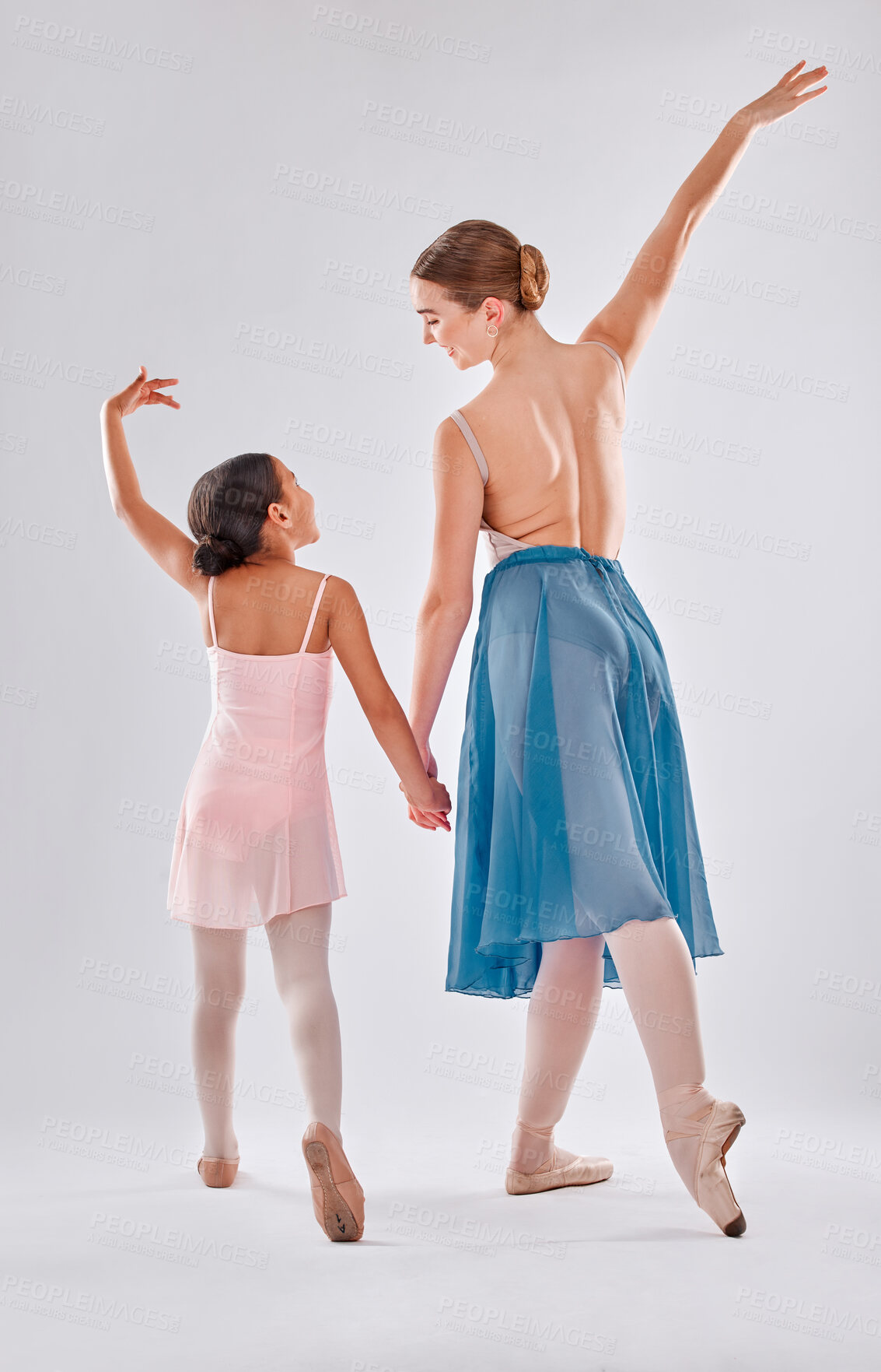 Buy stock photo Ballet, back and mentor with girl, training and performance with fitness, balance and grey studio background. Female dancer, ballerina and coach dancing for show, practice and wellness with support