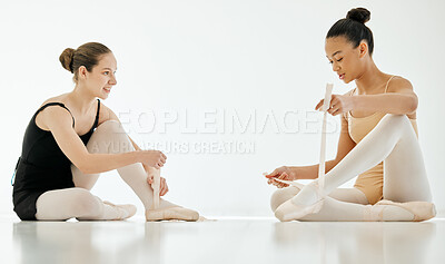 Buy stock photo People, ballet shoes and tying for performance, dancer and prepare in dance studio, legs and ribbons. Women, ballerina and ready for practice, competition and recital, friends and support by academy