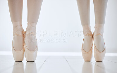 Buy stock photo Ballet, shoes and feet on pointe, flexibility and strong performance or exercise, training and fitness. Legs, people and active in dance studio, dancers and ballerinas or workout, together and cardio