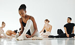 Ballet, art and young woman dancer training for show, performance or concert at dance school. Creative, elegant and classy African female ballerina stretch and practicing for theater in studio.