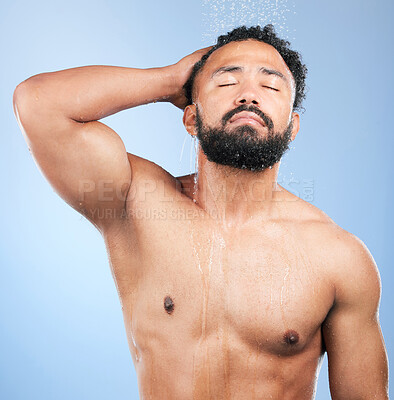 Buy stock photo Shower, cleaning and relax man with shampoo and calm from water, skincare and morning routine. Bathroom, cosmetics and male model in studio with blue background and dermatology for wellness and wash