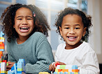 Laughing, children and playing with education, happy and smile from comedy and development. Toys, sibling and funny joke with sister love, youth care and support together with blocks for knowledge