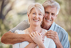 Portrait, summer and hug with a senior couple outdoor together for romance or bonding in retirement. Face, smile or nature with a confident elderly man and woman in a park garden for happy marriage