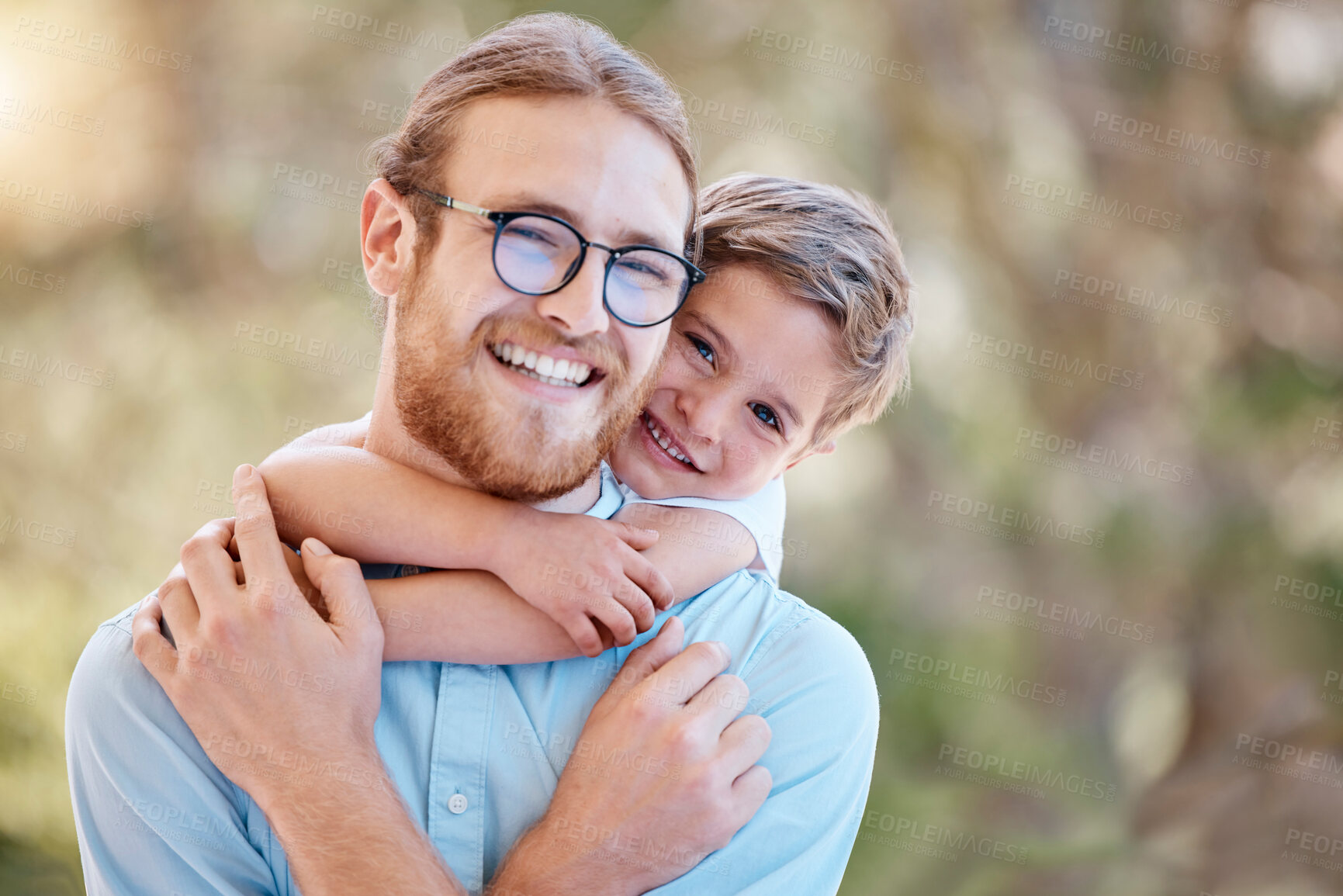 Buy stock photo Smile, nature and child hugging his father at an outdoor garden with love and care for bonding. Happy, backyard and portrait of boy kid embracing his young dad from Australia in a field or park.