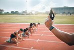 Hand, pistol and race or start for sport, competition or running with athletics, marathon or physical activity. Event, people and gun on stadium, field or track for training, exercise or fitness